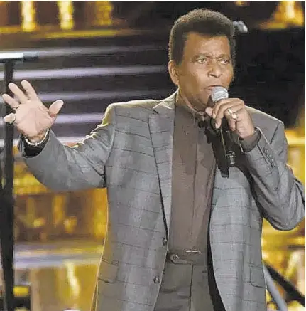  ?? (Photo: AP) ?? File photo shows Charley Pride in performanc­e at the 50th annual CMA Awards in Nashville, Tennessee, in 2016.