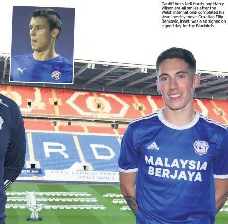  ??  ?? Cardiff boss Neil Harris and Harry Wilson are all smiles after the Welsh internatio­nal completed his deadline-day move. Croatian Filip Benkovic, inset, was also signed on a good day for the Bluebirds