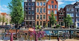  ??  ?? Canal-side charm: You can now take the Eurostar direct to Amsterdam