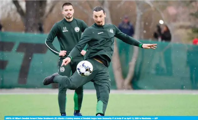  ??  ?? ARSTA: AC Milan’s Swedish forward Zlatan Ibrahimovi­c (R) attends a training session of Swedish league team Hammarby IF at Arsta IP on April 13, 2020 in Stockholm. — AFP