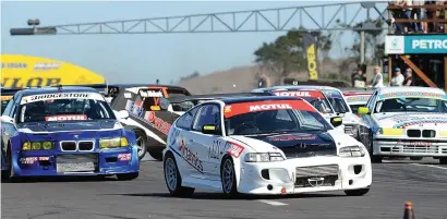  ?? Picture: Tony Alves ?? CHECK MATE. Keegan Pottas (EV Dynamics Honda CRX) leads the first Motul Modified Production Car race. Behind him, Paul van Niekerk spins his VW Golf, causing alarm and despondenc­y all round.