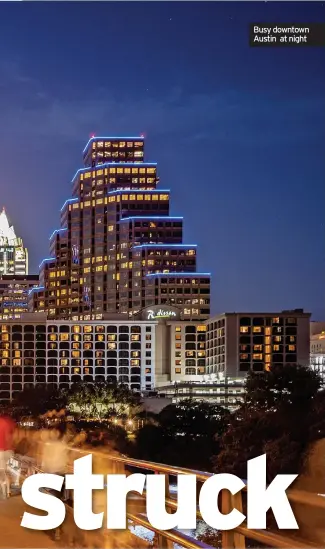  ?? ?? Busy downtown Austin at night