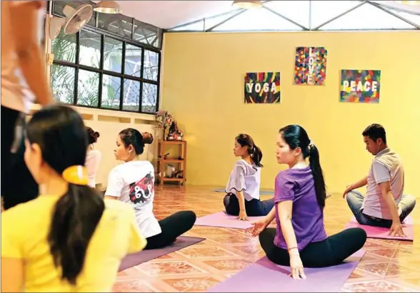  ?? SUPPLIED ?? Krama Yoga has started to provide yoga classes to private schools in Phnom Penh as part of their extracurri­cular programmes and physical education.