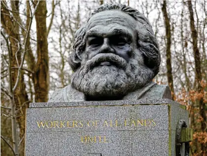  ?? ?? Stateless Londoner: Marx’s tomb at Highgate Cemetery; he lived in the city from 1849 to 1883