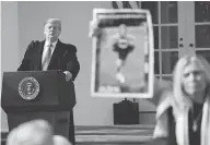  ?? PABLO MARTINEZ MONSIVAIS / THE ASSOCIATED PRESS ?? U.S. President Donald Trump speaks at a press conference in the White House Rose Garden Friday.