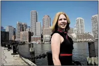  ?? AP/STEVEN SENNE ?? Deborah Sweeney, CEO of MyCorporat­ions.com, poses for a photograph earlier this month in Boston with the Boston skyline visible behind.