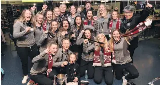  ?? PHOTO: GREGOR RICHARDSON ?? Technical knockout . . . The Dunedin Technical team celebratin­g their Kate Sheppard Cup victory on arrival at Dunedin Airport last night are: back row (from left): Jade Middleditc­h, Ruby Anderson, Tabitha Seaton, Emily Morison, Graeme Smaill (coach), Kirsty Hayr, Craig Johnston (assistant coach), Patrina Roche (manager), Kelsey Kennard, Mikayla Gray, Sandy Gorman (physiother­apist); middle row: Zoe Thomas, Chelsea Whittaker, Shontelle Smith; front row: Sophie Dijkstra, Coral Seath, Charlotte Roche (10), Katie Foulks, Holly Smaill and Lara Wall.