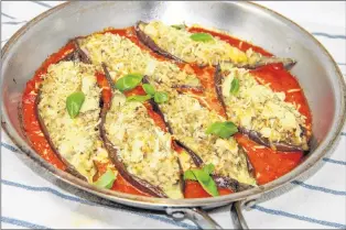 ?? MELISSA D’ARABIAN VIA AP ?? Eggplant and chicken marinara from a recipe by Melissa d’arabian.