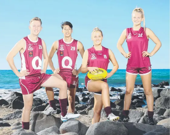  ?? Picture: RICHARD GOSLING ?? Riley Johnson, Alex Davies, Dee Heslop and Serene Watson will line up for Queensland in the under-16 AFL national titles on the Gold Coast.