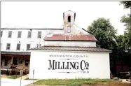  ??  ?? The Washington County Milling Co., a former flour mill built in 1919, will be filled with vendors and food during Junk at the Mill Thursday through Friday. Vendors will be inside the building and on its outside grounds. Admission and parking are free.