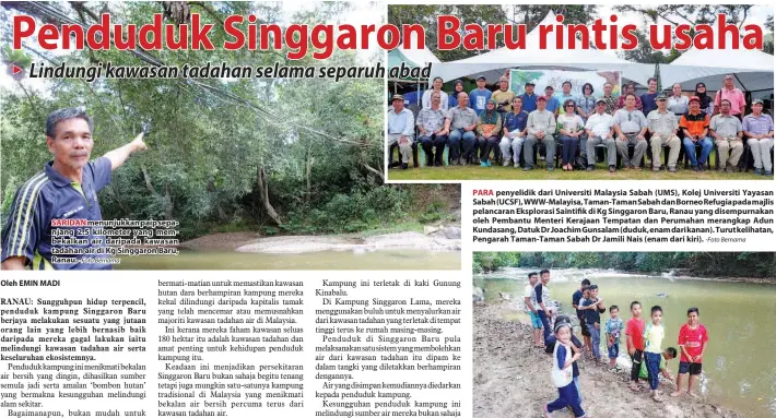  ?? -Foto Bernama ?? SARIDAN menunjukka­n paip sepanjang 2.5 kilometer yang membekalka­n air daripada kawasan tadahan air di Kg Singgaron Baru, Ranau.