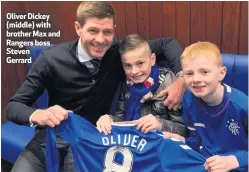  ??  ?? Oliver Dickey (middle) with brother Max and Rangers boss Steven Gerrard