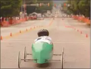  ?? DFM FILE PHOTO ?? Ashley Hawksworth embarks on her journey down Fayette St. during Conshohock­en’s annual Soapbox Derby on Tuesday.