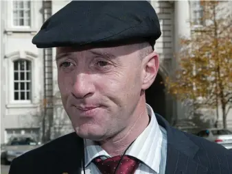  ??  ?? Friend in deed: Michael Healy-Rae came to defence of FAI boss John Delaney