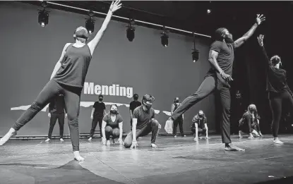  ?? Photos by Ronald Cortes / Contributo­r ?? Dancers perform “Mending” at a UTSA showcase titled “Defining Moments” at the Buena Vista Theater downtown on Nov. 19. UTSA students participat­ed in an art project to address the impact of COVID-19 on their lives and families.