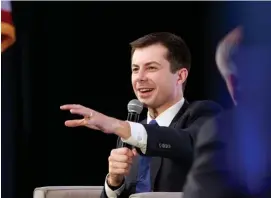 ?? GETTY IMAGES ?? I’LL BE HERE ALL WEEK: Democratic presidenti­al candidate and former South Bend, Ind., Mayor Pete Buttigieg was asked twice Monday what he would do if he won but President Trump refused to leave the White House, and he joked that he wanted to win by a large margin, “big enough that this election is beyond cheating distance.”