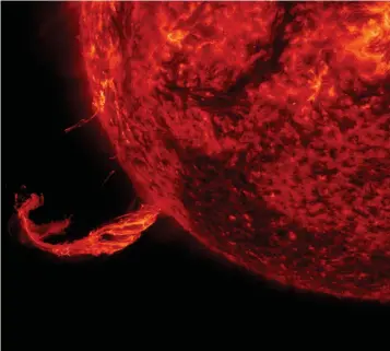  ??  ?? Above: This coronal mass ejection was recorded by the Solar Dynamics Observator­y in February 2015. A substantia­l part shot off into space.