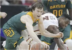  ?? ORLIN WAGNER / THE CANADIAN PRESS ?? Brady Heslip, left, is attempting to make the grade with the Toronto Raptors after playing two years in Europe.