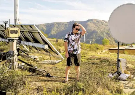  ?? PHILIP CHEUNG THE NEW YORK TIMES ?? Palmer Luckey, a founder of Anduril, stands among the equipment at his company’s testing range near Camp Pendleton. The company’s drones could be used alongside weapons. “Most people understand that this is part of what the military does,” Luckey said.