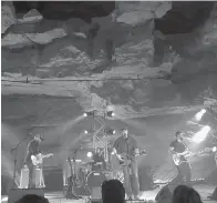  ?? Associated Press ?? ■ Singer-songwriter Chris Knight, center, and his band perform 333 feet below ground in Cumberland Caverns near McMinnvill­e, Tenn. Tennessee will soon have not just one, but two caves vying for fans who want to see music performed in a subterrane­an...