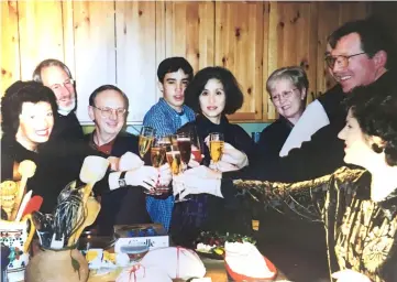  ??  ?? The author and his mother, Olivia Wu, centre. — WP-Bloomberg photos