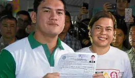  ??  ?? DUTERTE RUNNING Sebastian “Baste” Duterte, shown here with sister, reelection­ist Davao Mayor Sara Duterte, is seeking the vice mayor’s seat in the city.