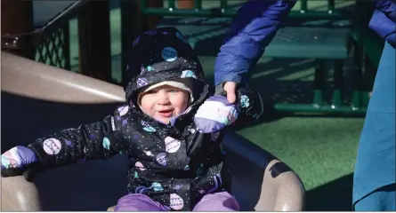  ?? MARIAN DENNIS — MEDIANEWS GROUP ?? Slides and more were enjoyed by kids of all ages Wednesday as the new all-abilities playground opened in Reeves Park.