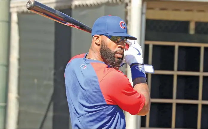  ?? JOHN ANTONOFF/SUN TIMES ?? Jason Heyward, practicing his batting stance before entering the batting cages Tuesday, has been through the highs and lows of success with the Cubs.