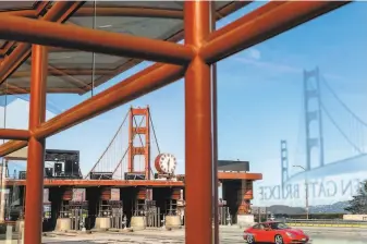  ?? Noah Berger / Special to The Chronicle ?? Instead of raising bridge tolls, the Golden Gate Bridge, Highway and Transporta­tion District board decided to lay off 146 workers to help cover budget deficits.