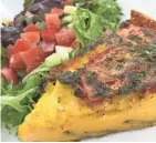  ?? MILWAUKEE JOURNAL SENTINEL ?? The Spanish omelet is served with salad at Buckley's Restaurant, 801 N. Cass St.
