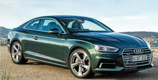  ?? PHOTOS: MARK BRAMLEY ?? THOSE LINES: The 2017 Audi A5 Coupe has arrived priced from $69,900. The volume seller is expected to be the 2.0 TFSI quattro (above) priced from $81,500. The new S5 Coupe now uses a 3.0-litre turbo V6 good for 260kW and 500Nm, and is as quick as the...