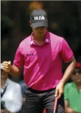  ?? EDUARDO VERDUGO — THE ASSOCIATED PRESS ?? India’s Shubhankar Sharma pumps his fist after his tee shot on the 3rd hole in the second round of the Mexico Championsh­ip at the Chapultepe­c Golf Club in in Mexico City, Saturday.