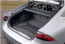  ??  ?? PRACTICALI­TY A7 Sportback’s boot has a big hatchback lid, opening up a 535-litre load area. Headroom in the back isn’t too compromise­d