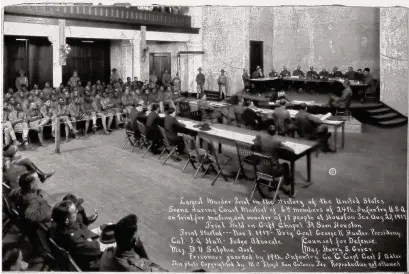  ?? Getty Images ?? An archival photo from the U.S. War Department shows the Aug. 23, 1917, court martial of 64 members of the 24th Infantry for mutiny and murder of 17 people in Houston. The 118 soldiers were tried at three courts-martial.