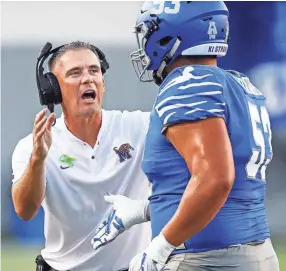  ?? MARK ?? Memphis coach Mike Norvell during action against UConn on Saturday. WEBER / THE COMMERCIAL APPEAL