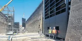  ?? PHOTO: RICHARD MILLAR ?? Paul Berry, Scottish Canals project manager and Jonathan Hall, Mackenzie Constructi­on site agent standing in Cullochy Locks, showing the scale of not only the lock gates but the size of the stone used to construct the lock chambers 200 years ago.