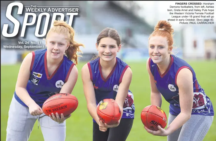  ?? Picture: PAUL CARRACHER ?? FINGERS CROSSED: Horsham Demons footballer­s, from left, Ashlee Ison, Greta Arnel and Hailey Puls hope the Western Victoria Female Football League under-18 grand final will go ahead in early October. Story page 40.