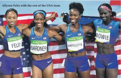  ??  ?? Allyson Felix with the rest of the USA team