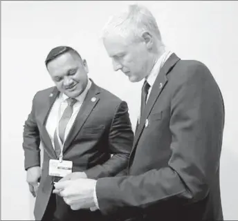  ?? ?? Minister Vickram Bharrat (left) in discussion with British Minister Lord Zac Goldsmith