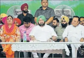  ?? PARDEEP PANDIT/HT ?? Chief minister Capt Amarinder Singh flanked in the front row by former CM Rajinder Kaur Bhattal (L) and Jalandhar MP Santokh Singh Chaudhary at Shahkot on Thursday.