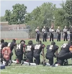  ?? CLARITZA JIMENEZ / THE WASHINGTON POST ?? The Woodland Hills Wolverines youth football team in Pennsylvan­ia has weathered abuse from opposing players and fans after kneeling during the U. S. anthem.