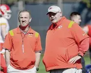  ?? Christian Petersen/Getty Images ?? Kansas City Chiefs defensive coordinato­r Steve Spagnuolo, left, talks with coach Andy Reid in a practice session prior to Super Bowl LVII at Arizona State University Practice Facility on Thursday in Tempe, Ariz.