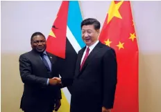  ??  ?? Presidente­s de Moçambique e da China estão em sintonia AFP