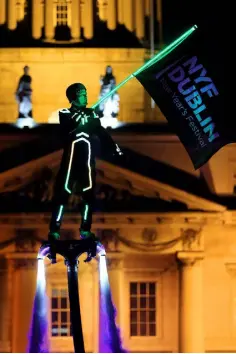  ??  ?? MEANWHILE IN DUBLIN...A flyboarder at last night’s dress rehearsal for tonight’s festivitie­s. Photo: Gerry Mooney