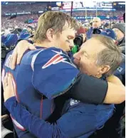  ?? MADDIE MEYER/GETTY IMAGES ?? Patriots QB Tom Brady celebrates winning the AFC Championsh­ip Game with head coach Bill Belichick on Jan. 21.