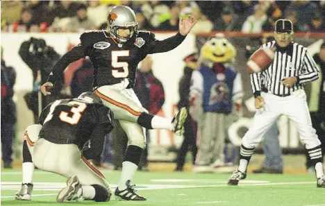  ?? FILES ?? The B.C. Lions’ Lui Passaglia takes his last career CFL kick, a convert, at the Grey Cup game at McMahon Stadium in Calgary in 2000.