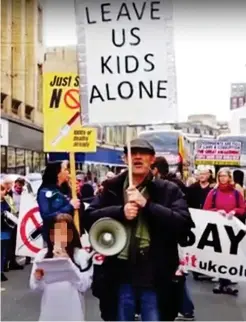  ?? ?? Anger: Ian Spence and daughter at a protest in Bristol