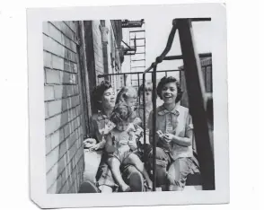  ?? ?? /
For Juan Negroni, this photo from an old friend with her sisters on the fire escape of their Spanish Harlem tenement surfaced memories.