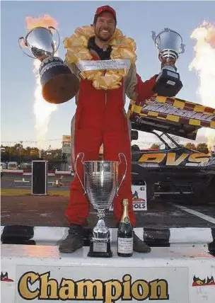  ?? Colin Casserley ?? ●● Kelvyn Marshall celebrates his World Championsh­ip triumph at Hednesford Raceway at the weekend