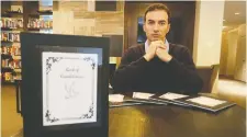  ?? TONY CALDWELL ?? Soroush Zorryasate­in has made books of condolence­s, signed by hundreds of Iranian-Canadians, to be presented to all countries with citizens aboard the plane shot down in Iran.